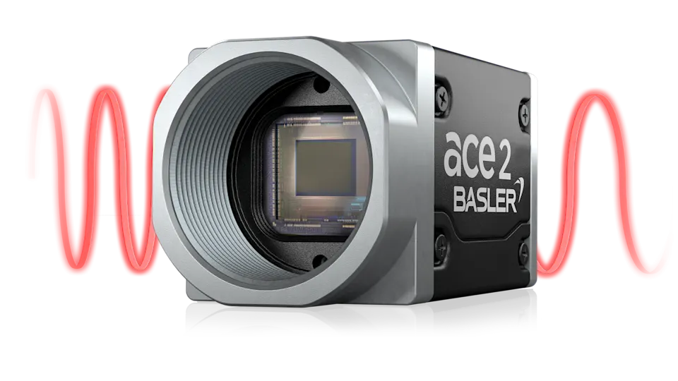 basler-ace-2-x-vis-swir-camera As câmaras ace 2 X visSWIR oferecem uma qualidade de imagem superior tanto no espetro visível como no infravermelho de ondas curtas. Compactas e económicas, destacam-se em aplicações como a penetração em estruturas complexas ou a deteção de objetos ocultos, onde as câmaras SWIR convencionais são demasiado grandes ou caras.